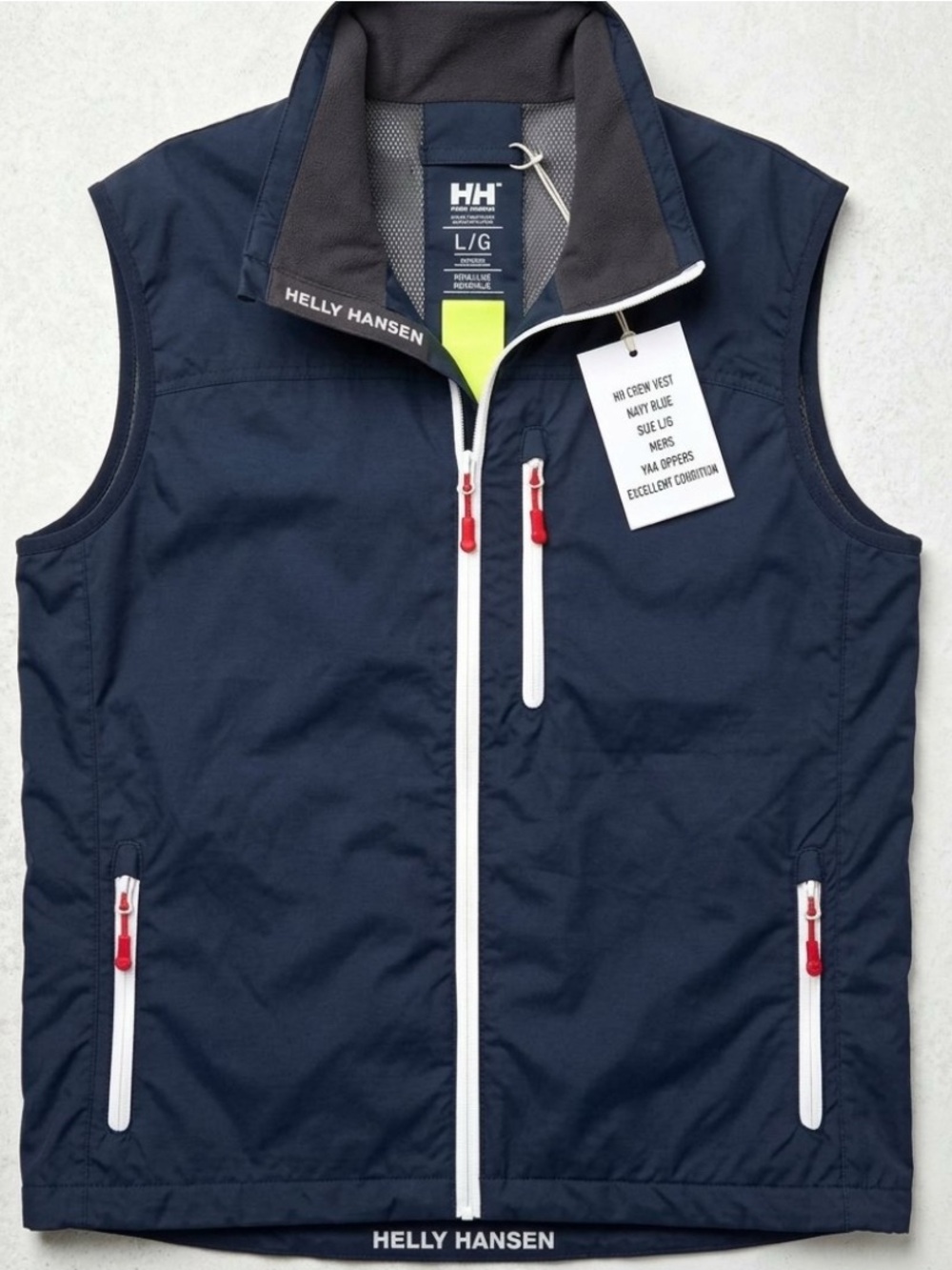 Helly Hansen Navy Vest with White Zippers and Red Pulls